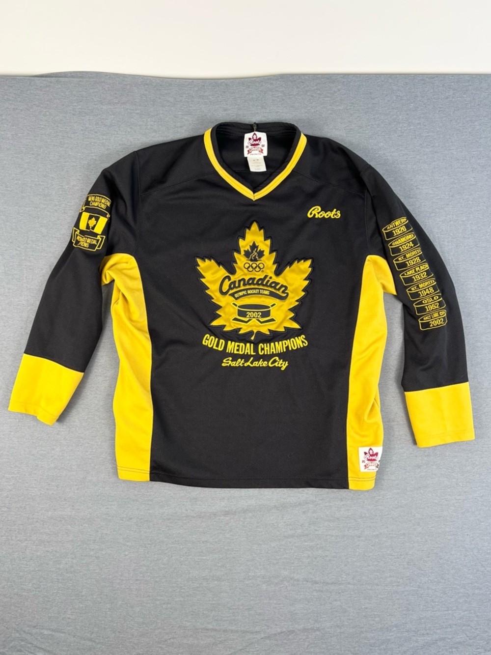 Roots Black and Yellow 'Canadian Gold Medal Champions' Hockey Jersey